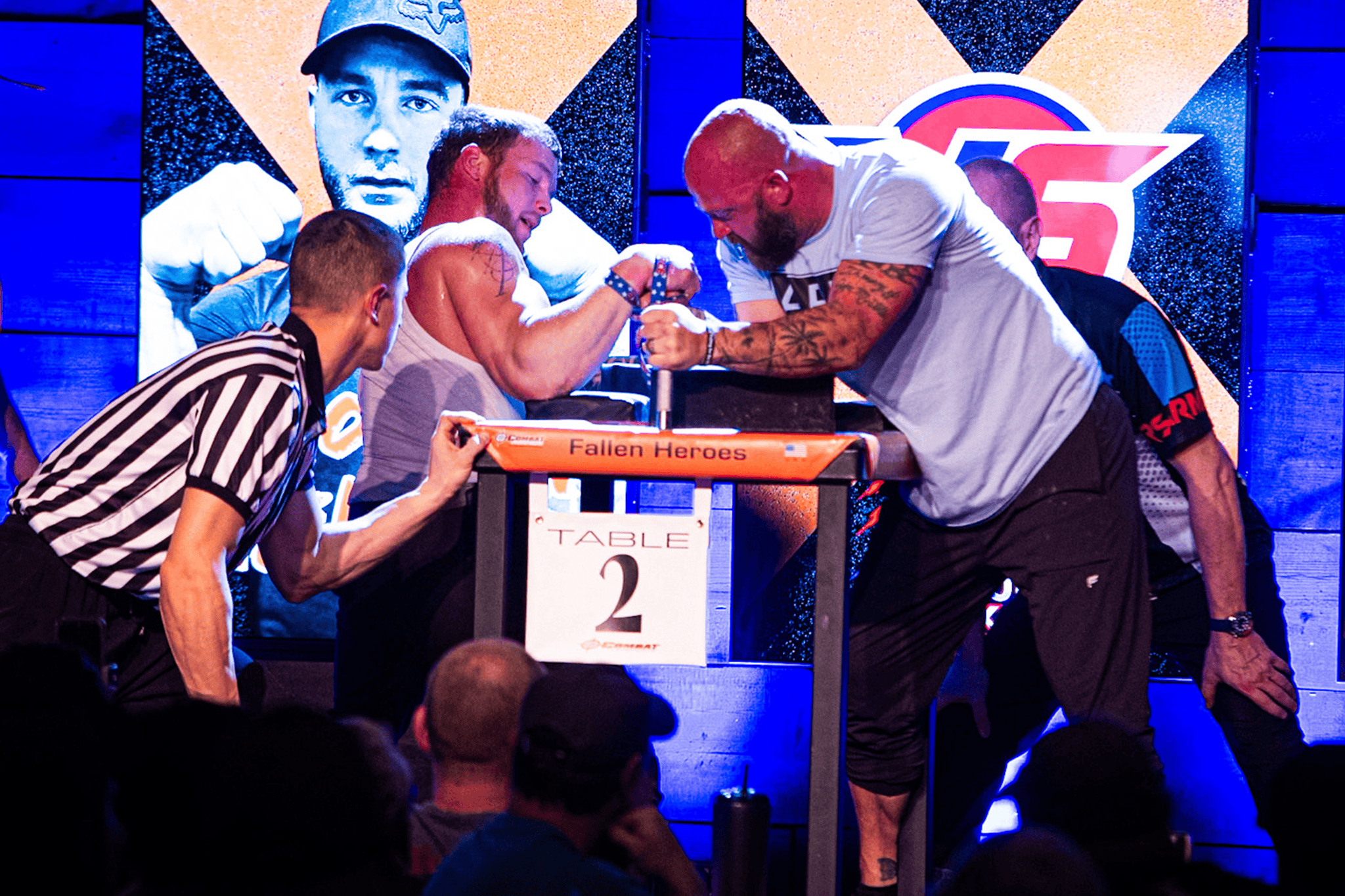 Armwrestlers competing at the table